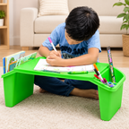 Boy using green kids lap desk with books and markers in side storage