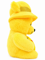 Yellow teddy bear with a hat on a white background
