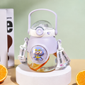 Purple kids water bottle with crossbody strap printed Happy Every Day, styled with oranges