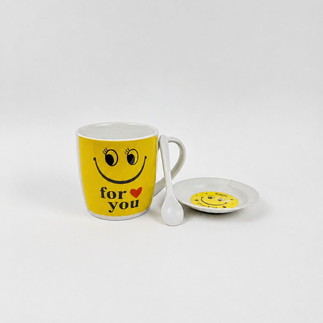 Yellow mug with smiley face and 'for you' text, accompanied by a matching coaster on a white background.