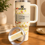 Stanley Quencher tumbler with lid off, showing straw opening and autumn print
