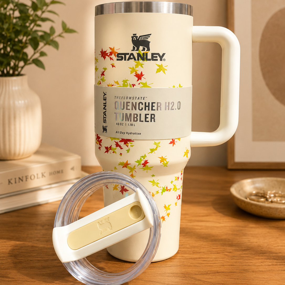 Stanley Quencher tumbler with lid off, showing straw opening and autumn print