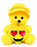 Yellow teddy bear with a sequin heart that changes color on a white background