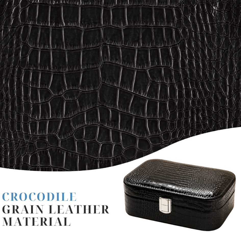 Black leather jewelry box angled view showing crocodile texture